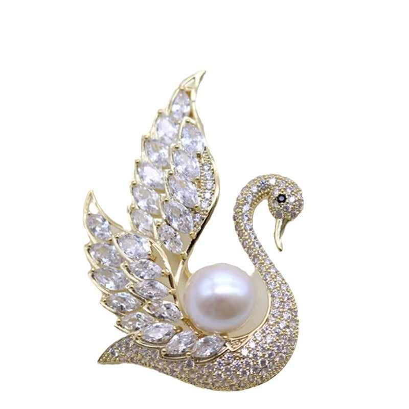 Swan brooch styled on coat image 5