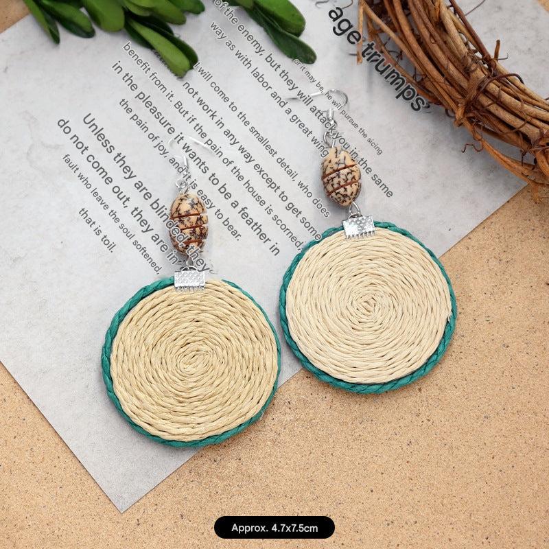 Close-up of Rattan Earrings on display