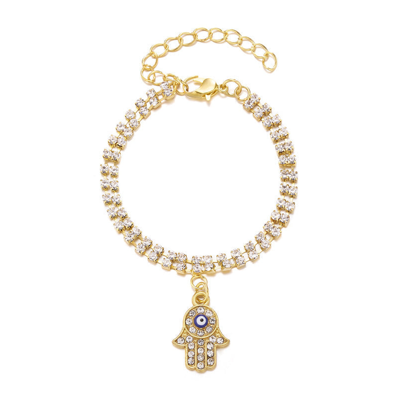 Adjustable crystal bracelet with blue eye and starfish design