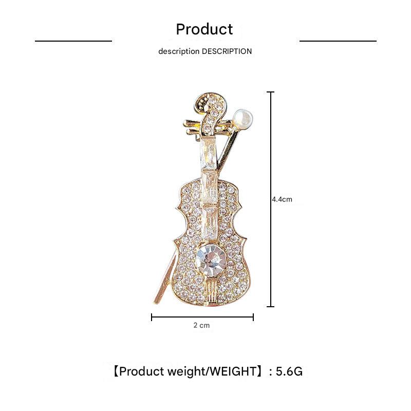 Violin Brooch on fabric display
