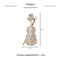 Violin Brooch on fabric display