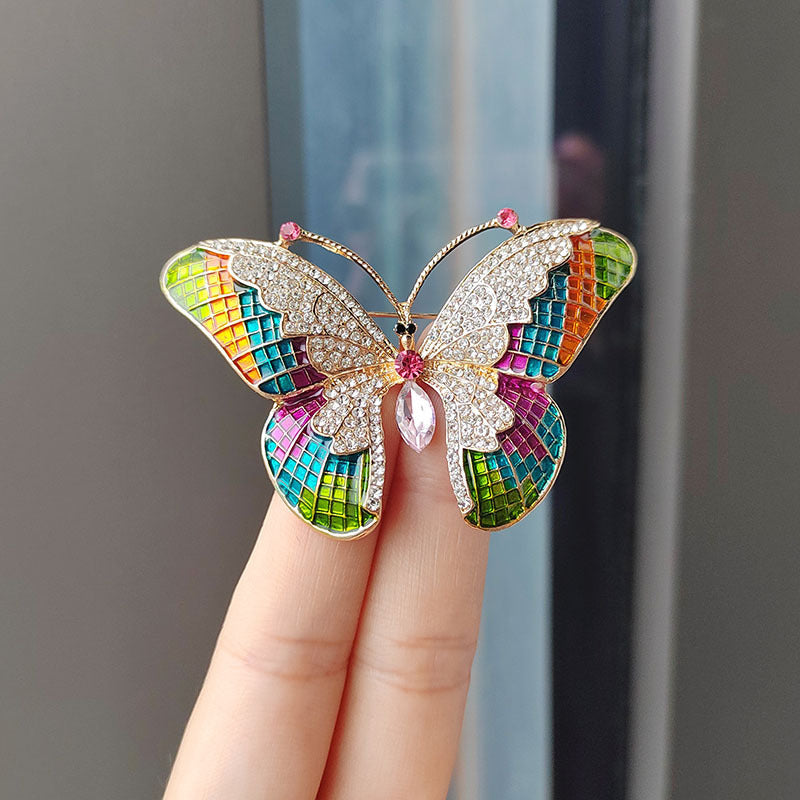 Detailed view of a vibrant butterfly brooch
