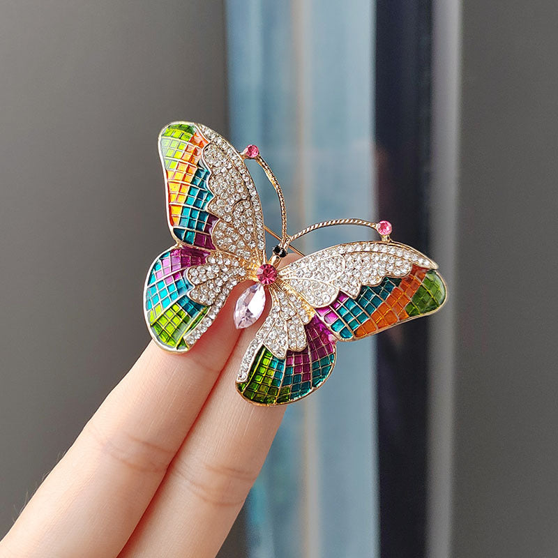 Stylish butterfly brooch worn on a scarf