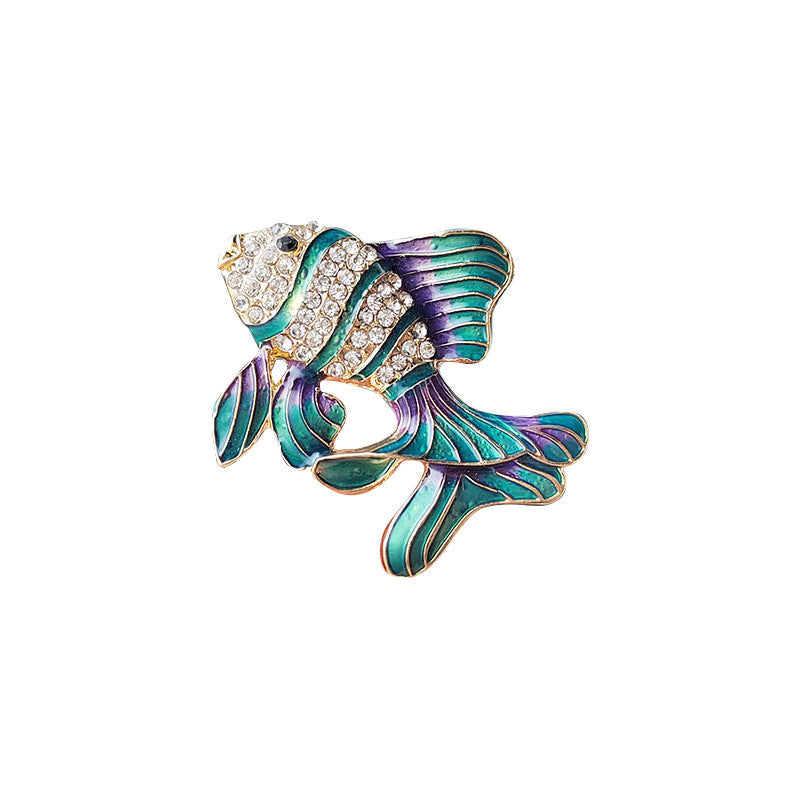 Stylish outfit with tropical fish brooch