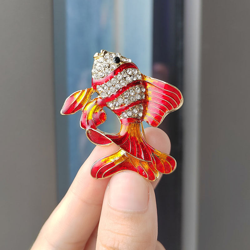 Casual outfit accessorised with fish brooch