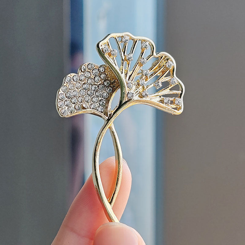 Elegant brooch showcased on black jacket image 6
