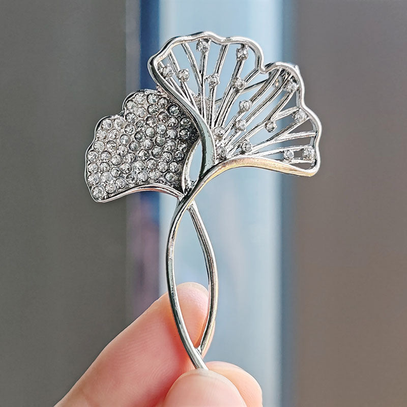 Fashionable brooch on formal attire image 7