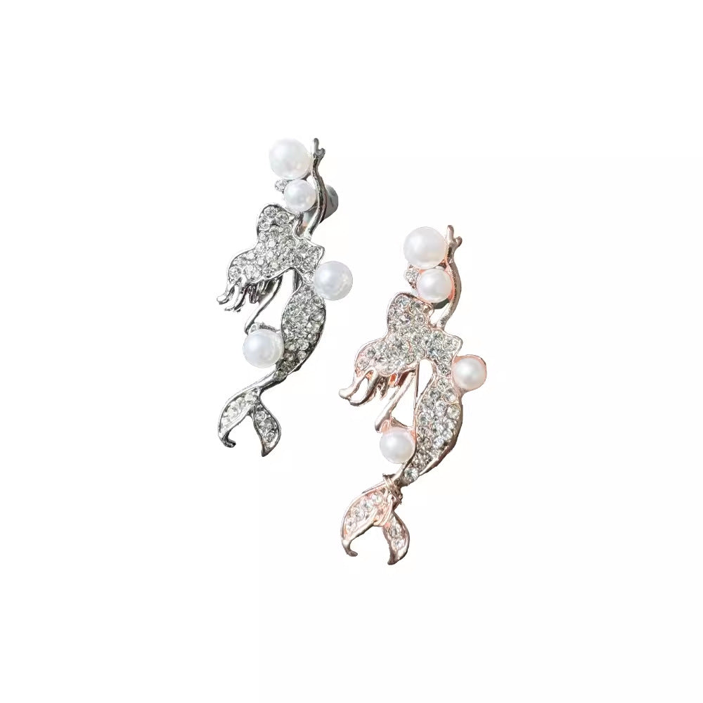 detailed view of crystal adorned brooch