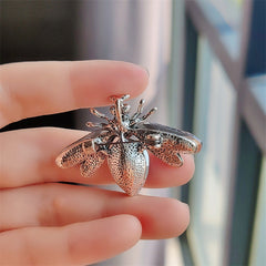 Charming bee pin styled with casual outfit image 9