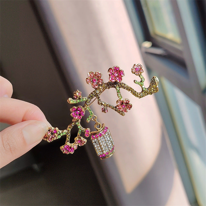 Elegant brooch placed on fabric background