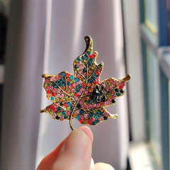 Front angle of colourful rhinestone brooch