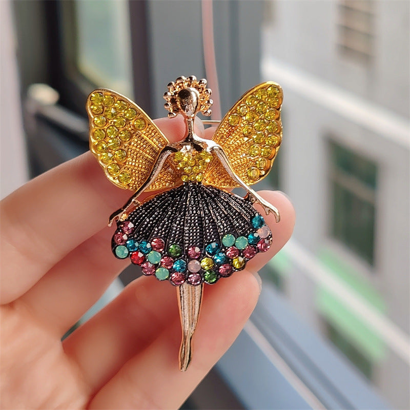 Flat lay of charming brooch with rhinestones
