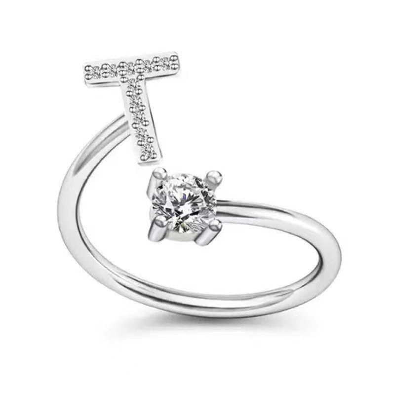 Fashionable women's alphabet ring on display
