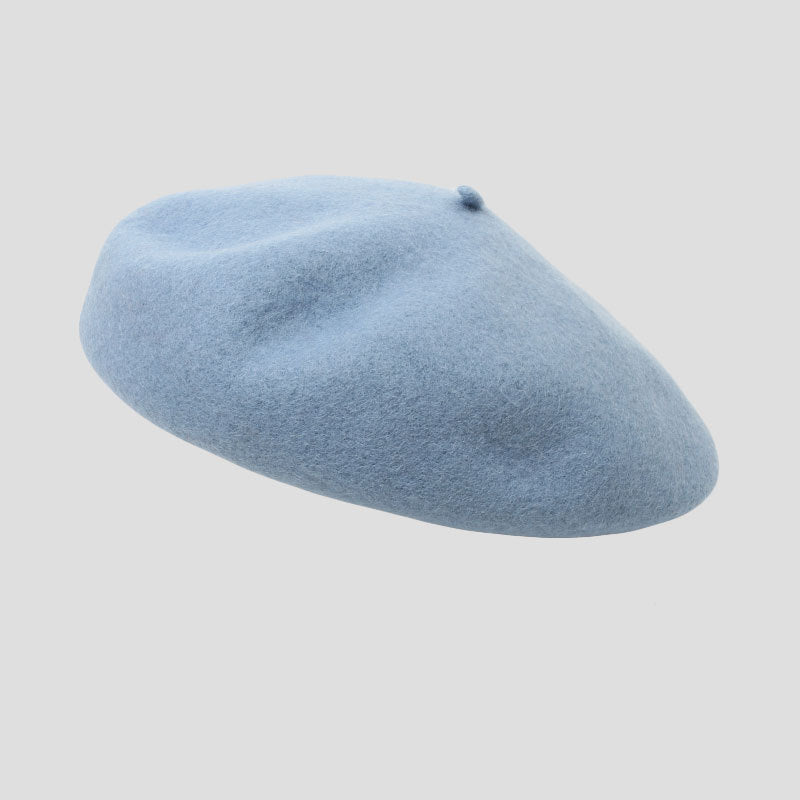 Adjustable drawstring feature on wool beret
