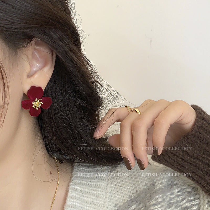 Floral Earrings showcased on a model