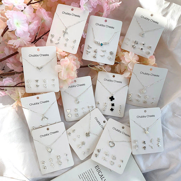 Various angles of colourful animal earrings