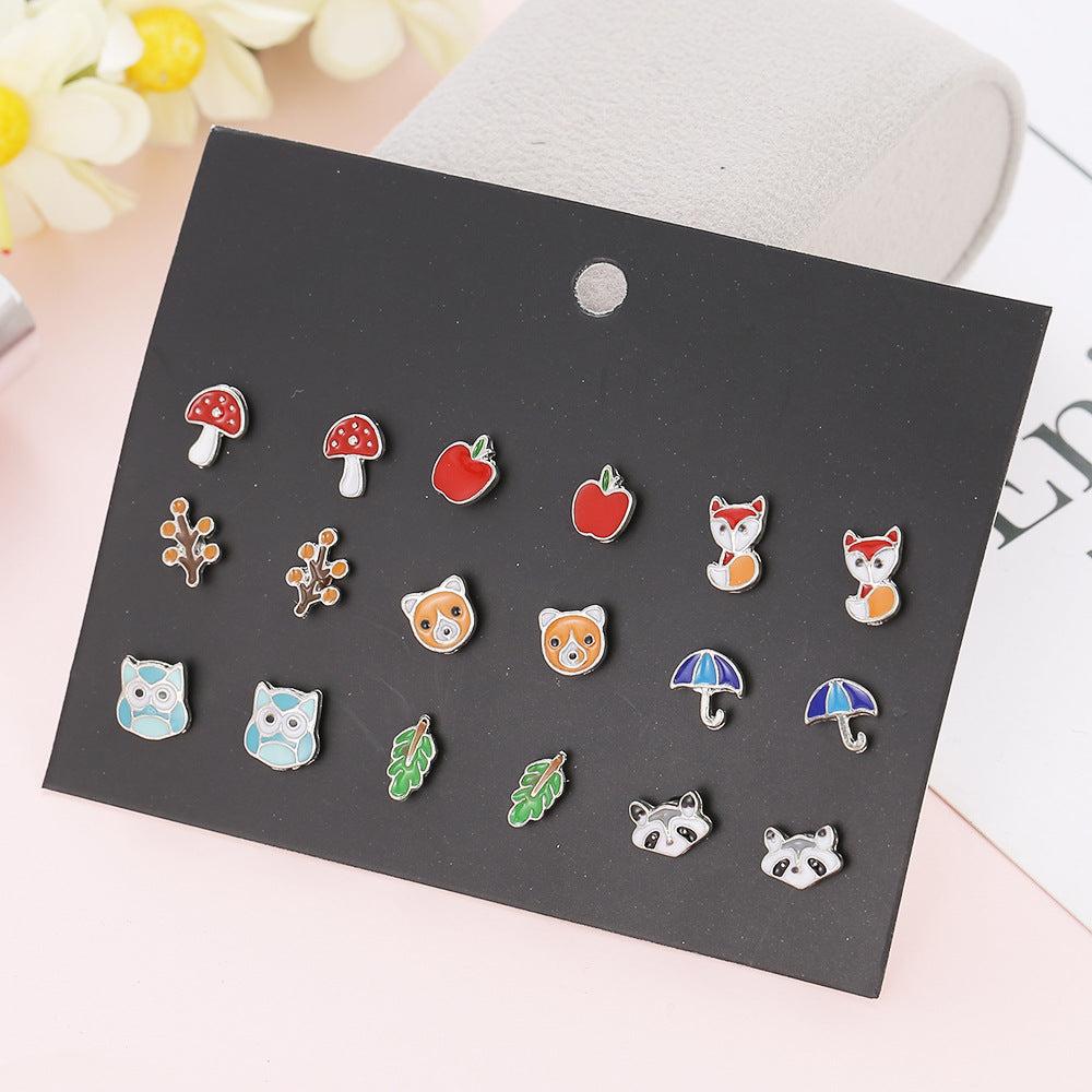 Close-up of fox earrings and their details