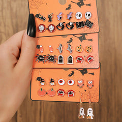 Frog earrings showcased with vibrant colours