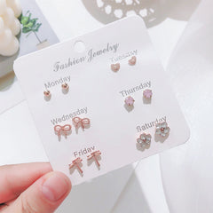 Stylish Korean Autumn Winter Pearl Bow Earrings Set - Image 10