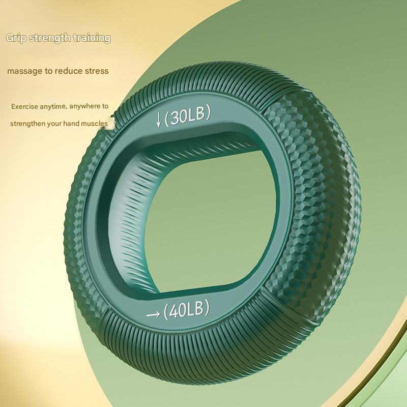 Close-up of silicone grip strengthener in hand