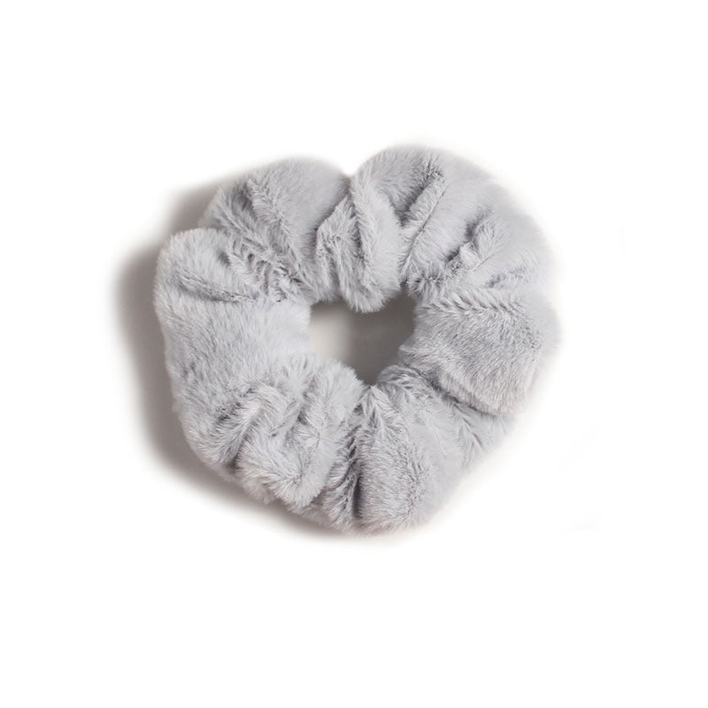 Winter-friendly hair band for children in beige