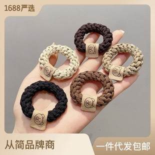 Winter-friendly hair band for children in beige