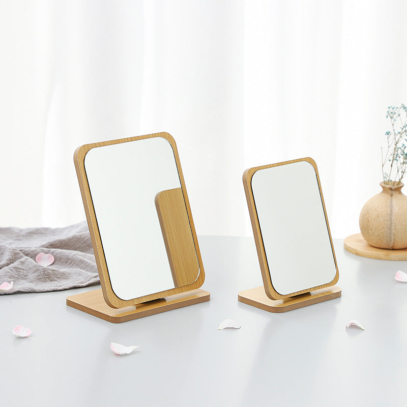 Foldable wooden makeup mirror displayed