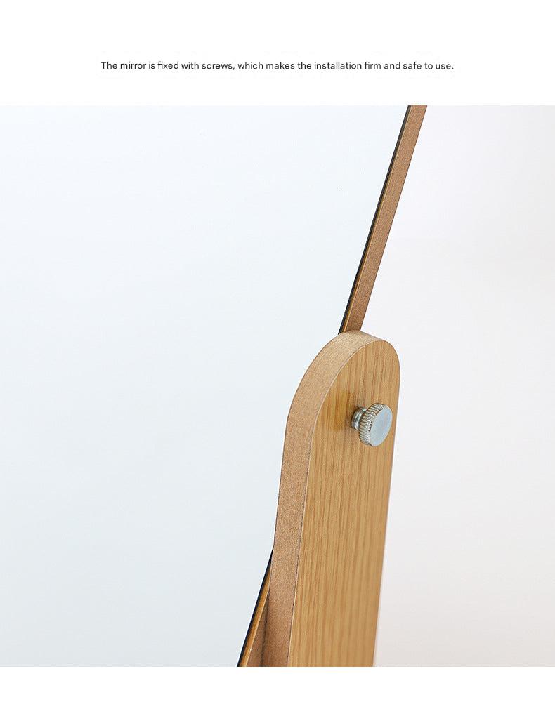 Compact wooden makeup mirror on desk